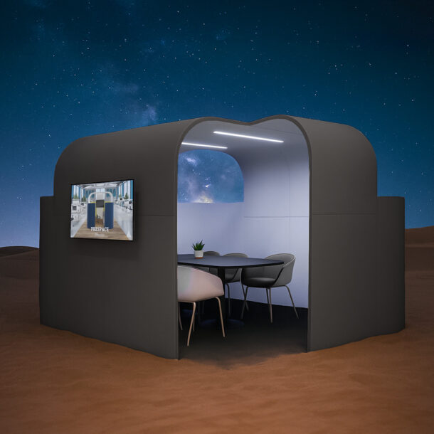 Schwarze Akustik Meetingbox Discreto für Office mit Meetingtisch und Stühlen